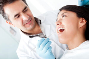 Dentist Examining a Patient's Teeth – Arlington Heights, IL – Dan Czapek, DMD